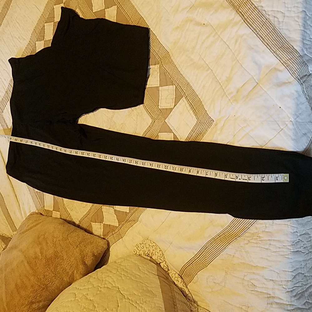 New in plastic black leggings